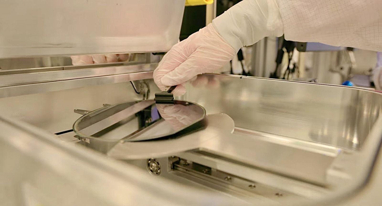 A semiconductor wafer being handled inside a fabrication plant