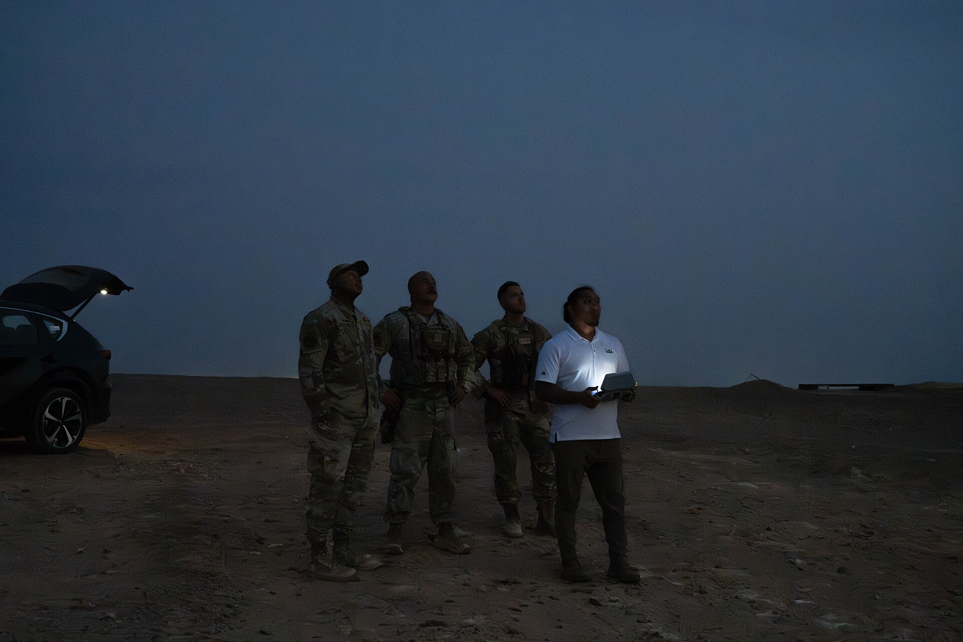 A military quadcopter drone being launched